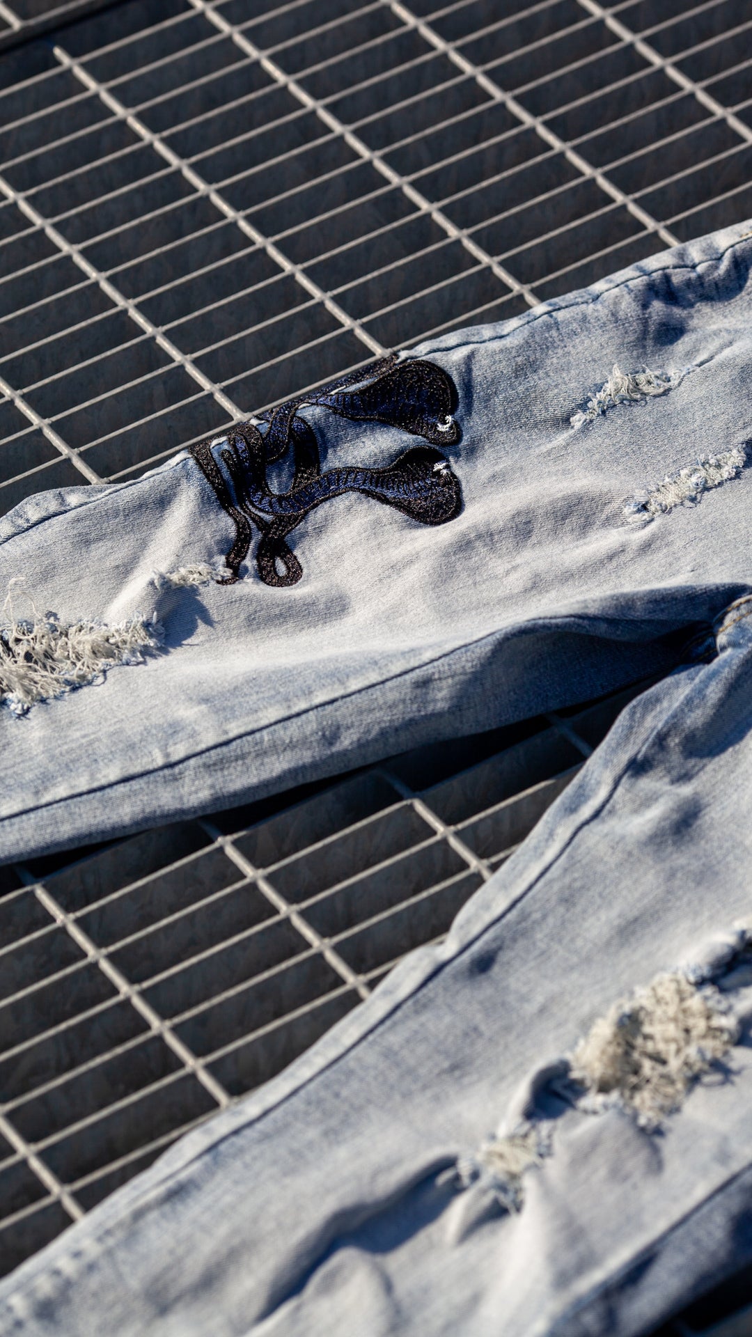 BLACK SNAKE SLIM JEANS